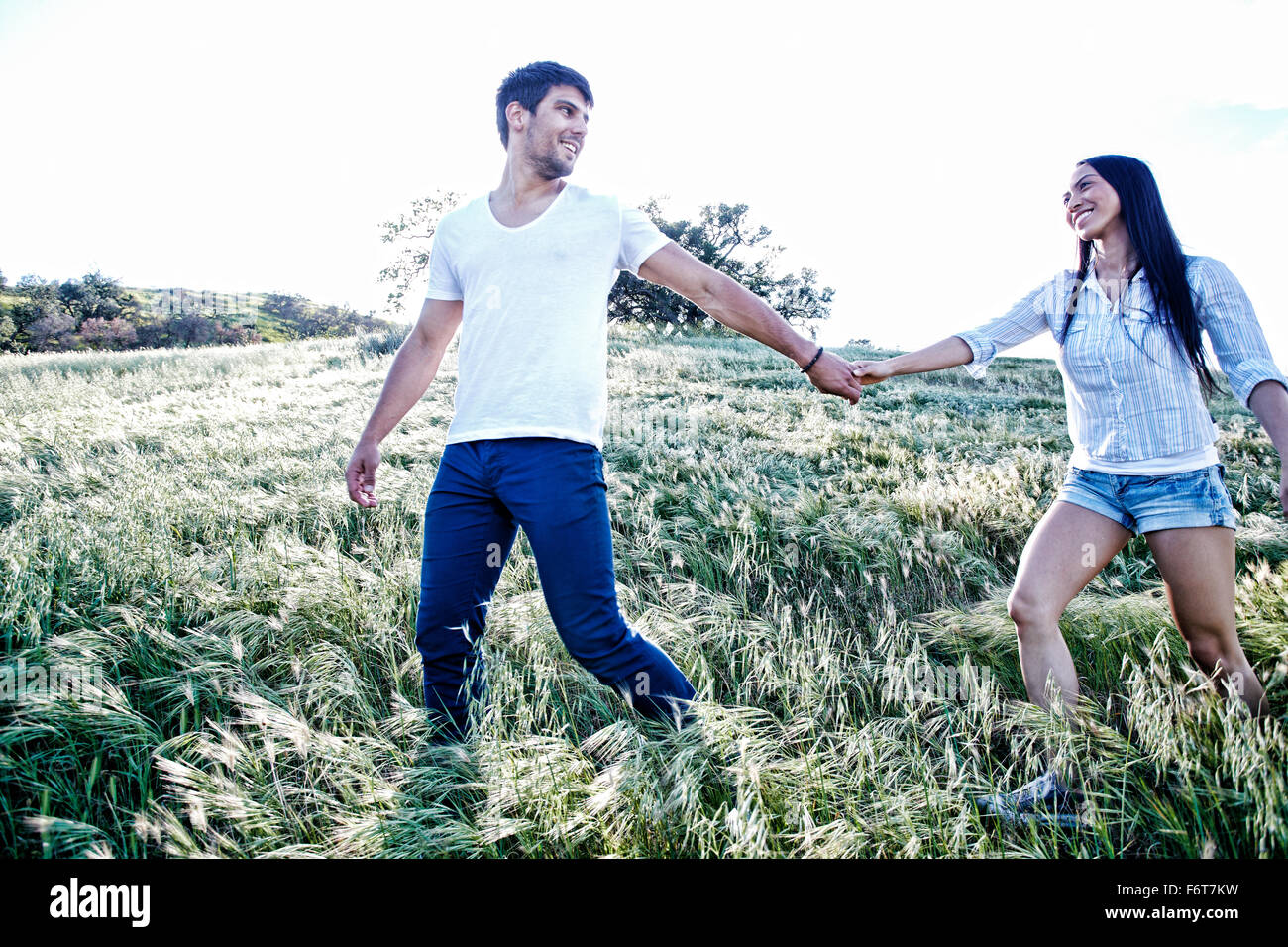 Black couple holding hands hi-res stock photography and images - Alamy