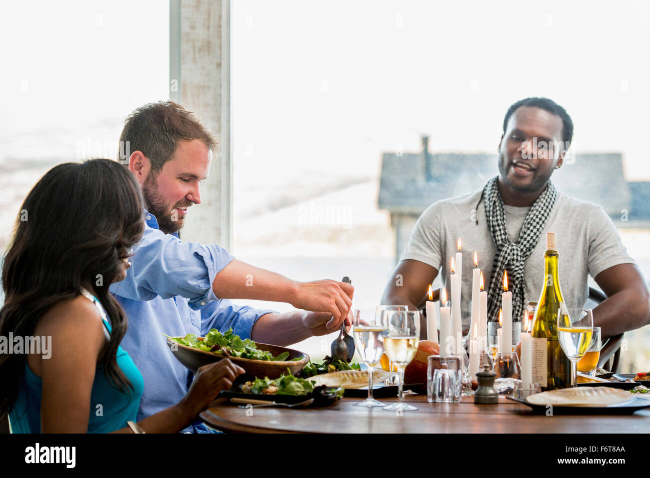 Friends eating at dinner party Stock Photo