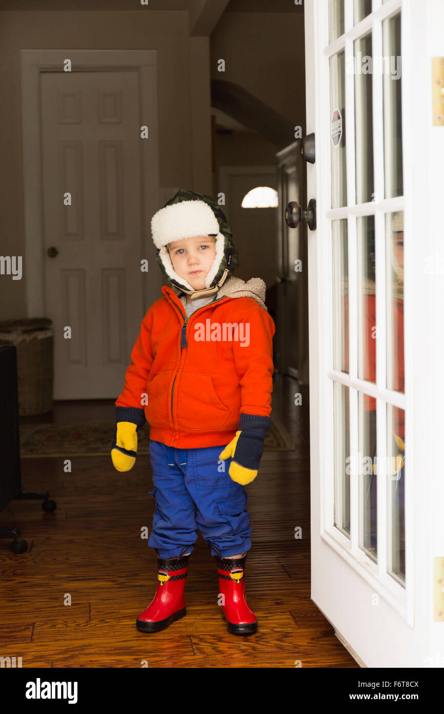 Caucasian boy wearing snow gear Stock Photo
