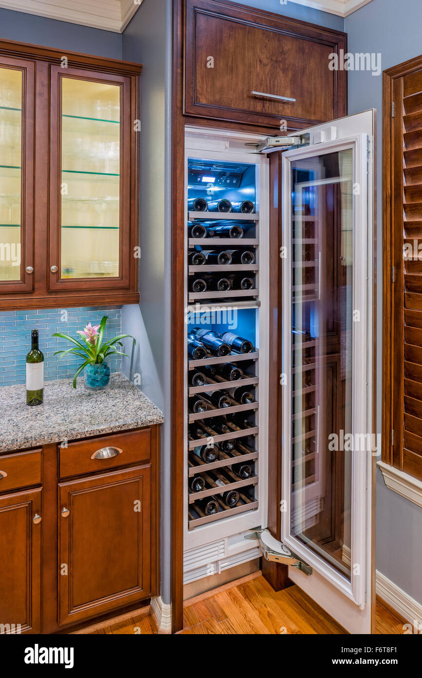 Open bottle cooler in modern kitchen Stock Photo