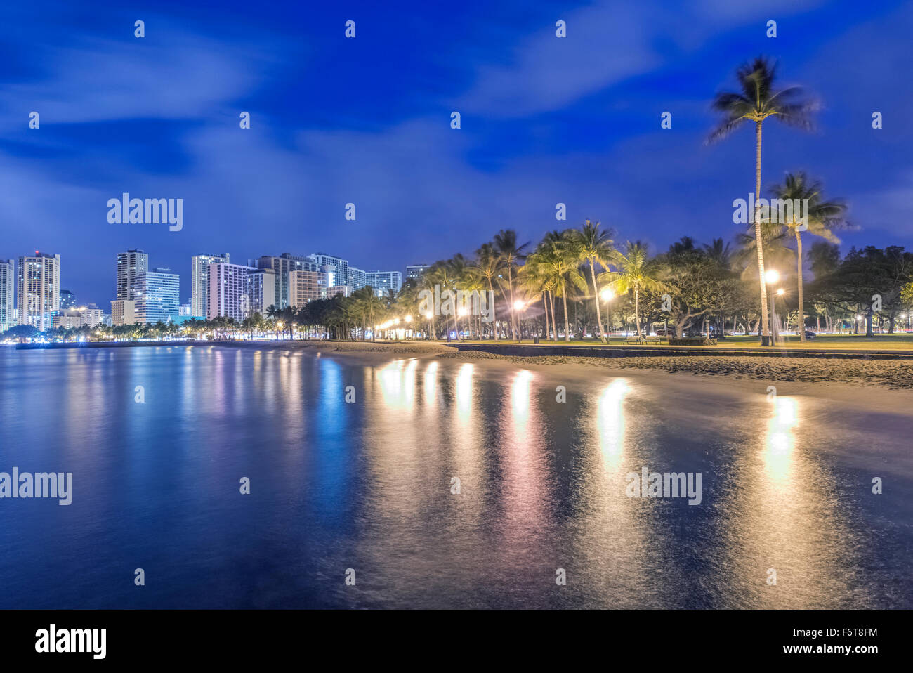 Honolulu city skyline reflection in ocean, Hawaii, United States Stock Photo