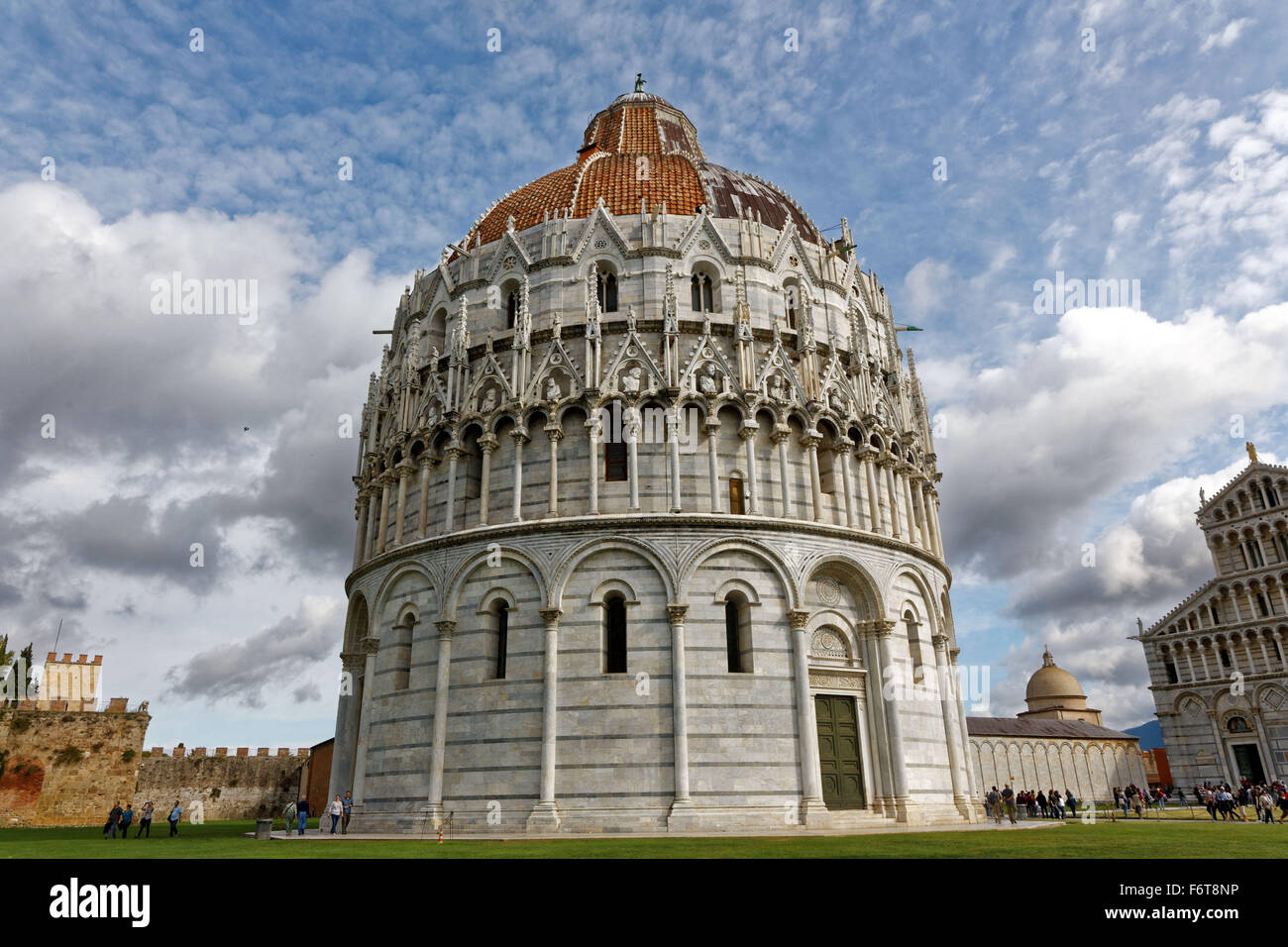 The Bapitistry in the Piazza dei Miracoli, or Fields of Miracles in the Italian city of Pisa. Stock Photo