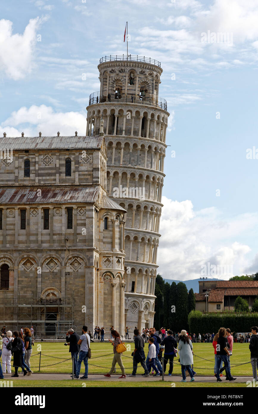 The Duomo di Pisa cathedral in the Piazza dei Miracoli, or Square of Miracles and the leaning tower in the Italian city of Pisa. Stock Photo