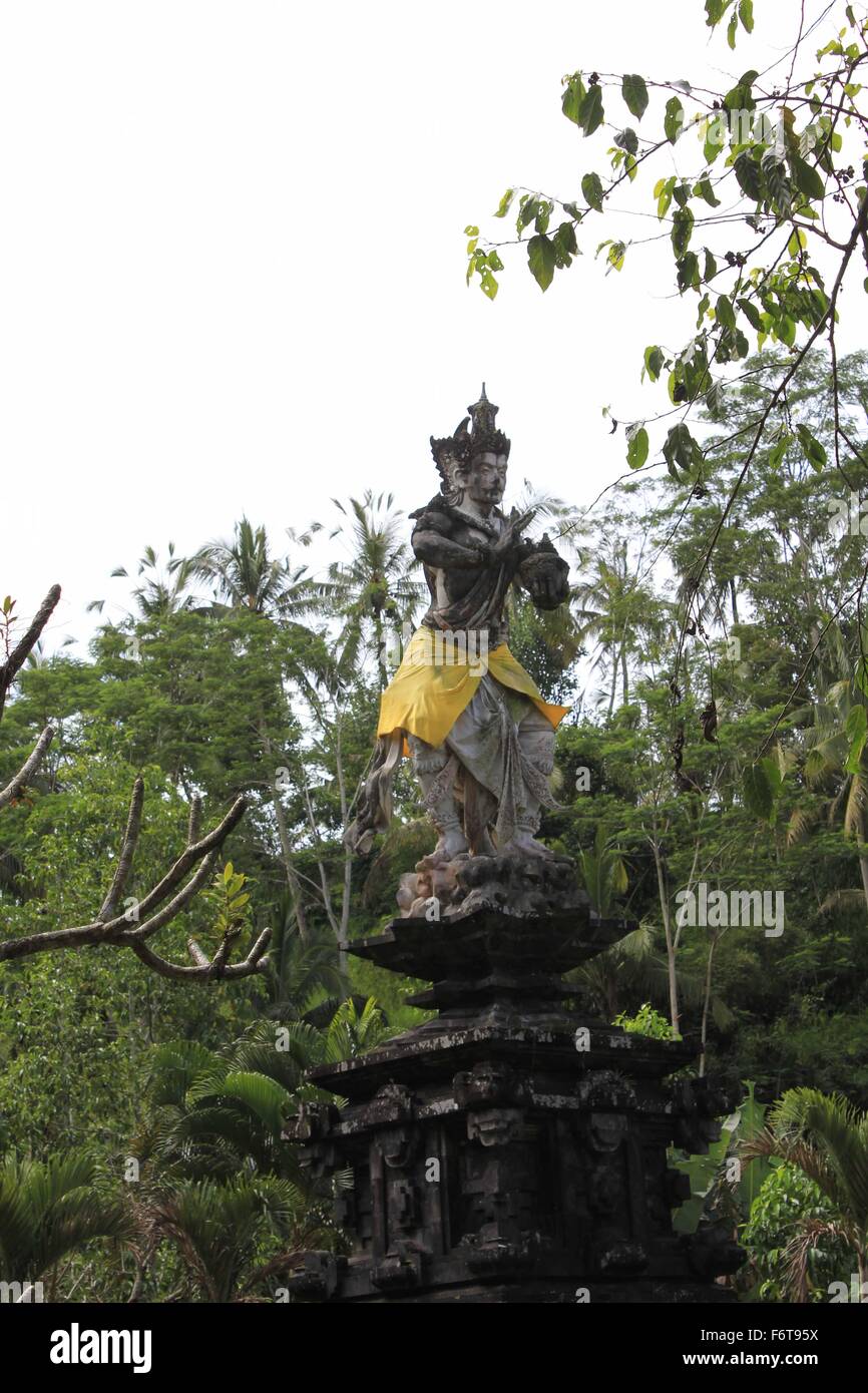 Indonesian statue through nature, Bali Stock Photo Alamy