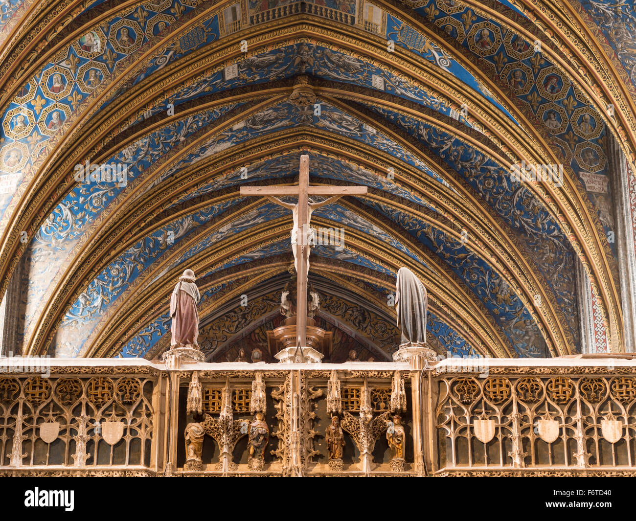 Crucified Christ, Mary and Joseph at Albi. Statues of Christ on the cross flanked by Mary and Joseph from their rear and inside Stock Photo