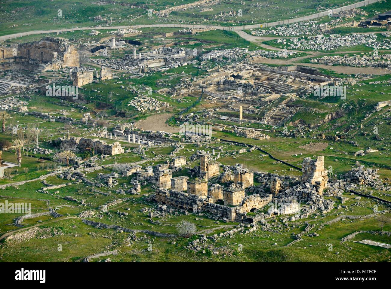 Ancient Greek Roman city of Hierapolis at Pamukkale, Denizli, Turkey. Aerial over 6 C church to Nymphaeum and Temple of Apollo Stock Photo