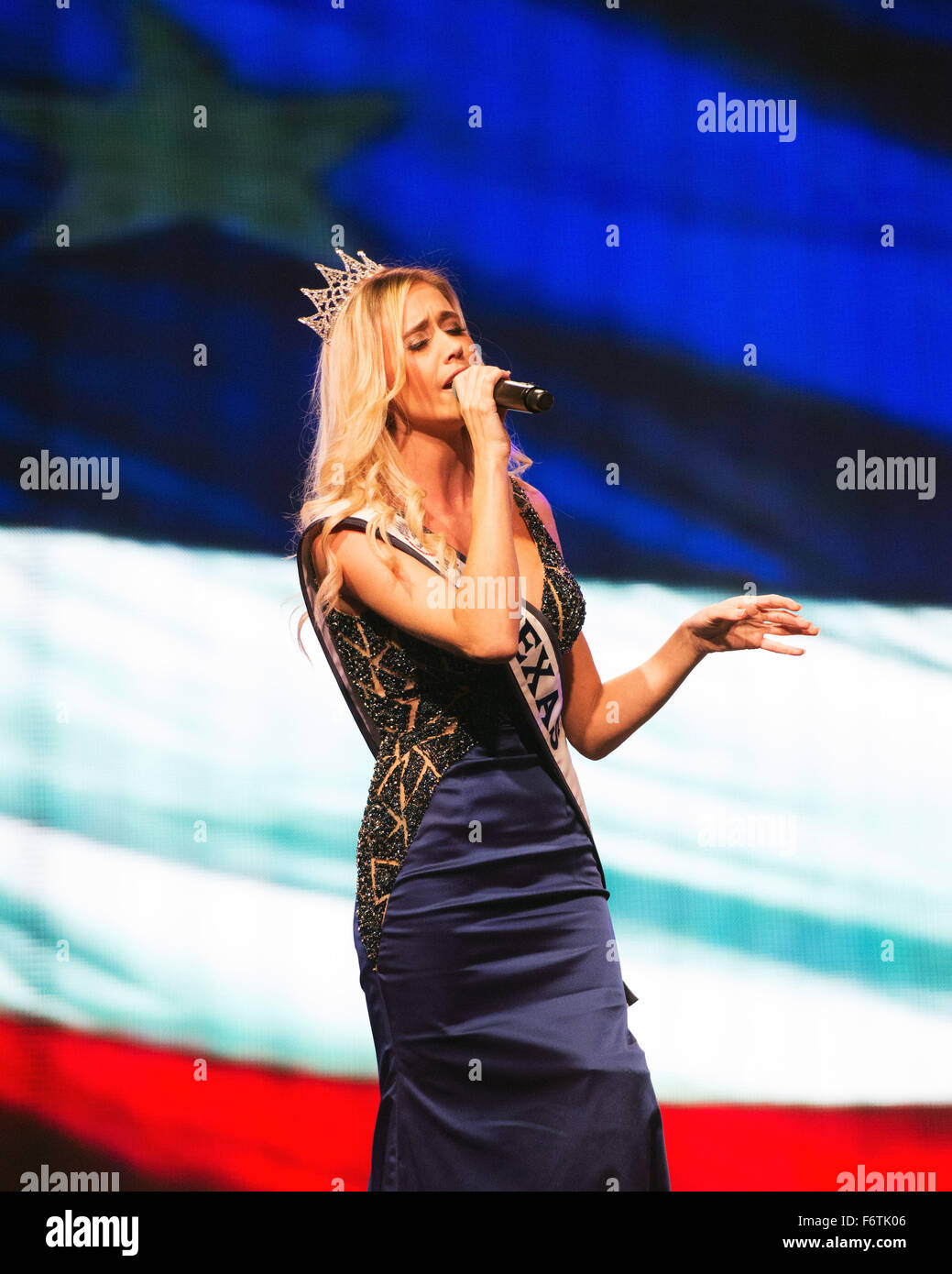 Houston, Texas, USA. 19th November, 2015. November 19, 2015:2015  Miss Texas, Sarah Marie Blanon sings 'America The Beautiful' at the Opening ceremonies of the World Weightlifting Championships in  Houston, Texas. Credit:  Brent Clark/Alamy Live News Stock Photo
