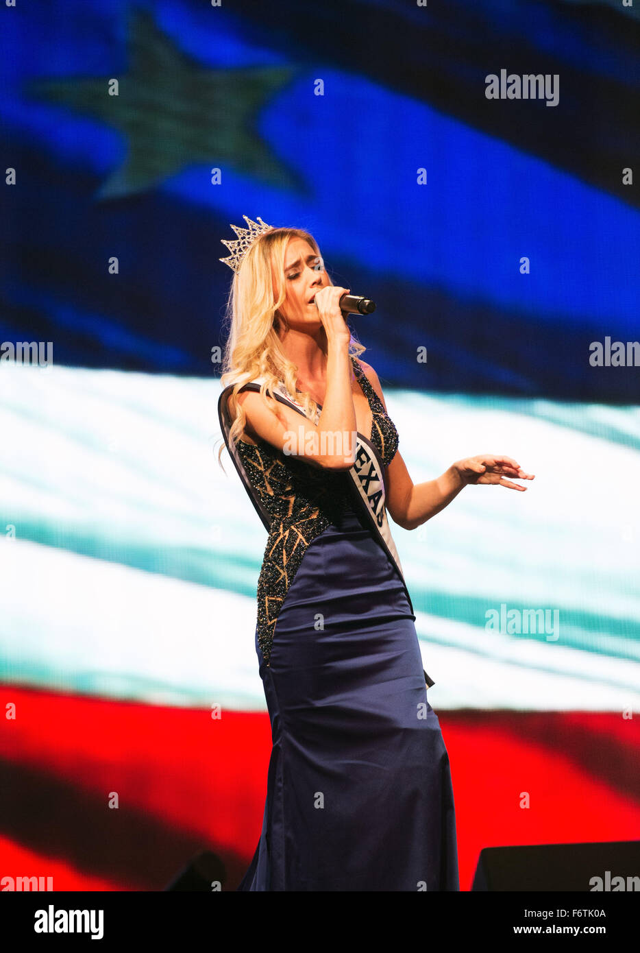 Houston, Texas, USA. 19th November, 2015. November 19, 2015: 2015  Miss Texas, Sarah Marie Blanon sings 'America The Beautiful' at the Opening ceremonies of the World Weightlifting Championships in Houston, Texas. Credit:  Brent Clark/Alamy Live News Stock Photo