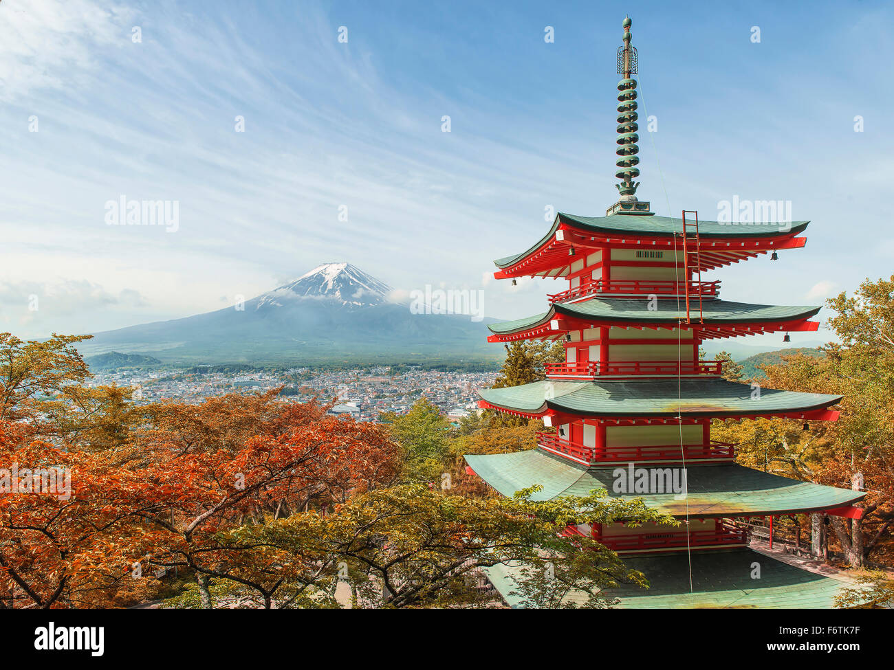 Travel destination - Mt. Fuji with red pagoda in Spring, Fujiyoshida, Japan Stock Photo