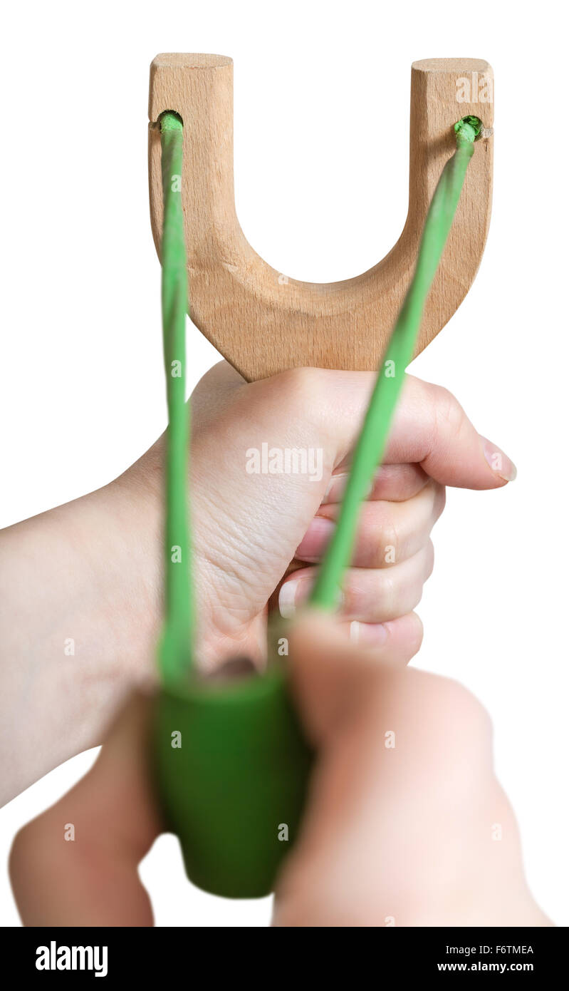 aim and shoot from wooden slingshot isolated on white background Stock Photo