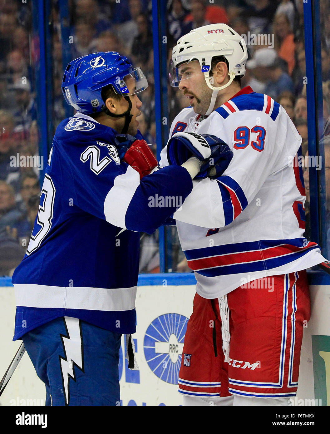 Tampa, Florida, USA. 19th Nov, 2015. DIRK SHADD | Times .Tampa Bay Lightning right wing J.T. Brown (23) and New York Rangers defenseman Keith Yandle (93) deal with each other during first period action at the Amalie Arena in Tampa Thursday evening (11/19/15). Brown appeared to get under the skin of his opponents, this time New York Rangers defenseman Dan Boyle (22) (not pictured) ended up joining Yandle in the altercation. Both Brown and Dan Boyle ended up picked up roughing penalties on the play. © Dirk Shadd/Tampa Bay Times/ZUMA Wire/Alamy Live News Stock Photo
