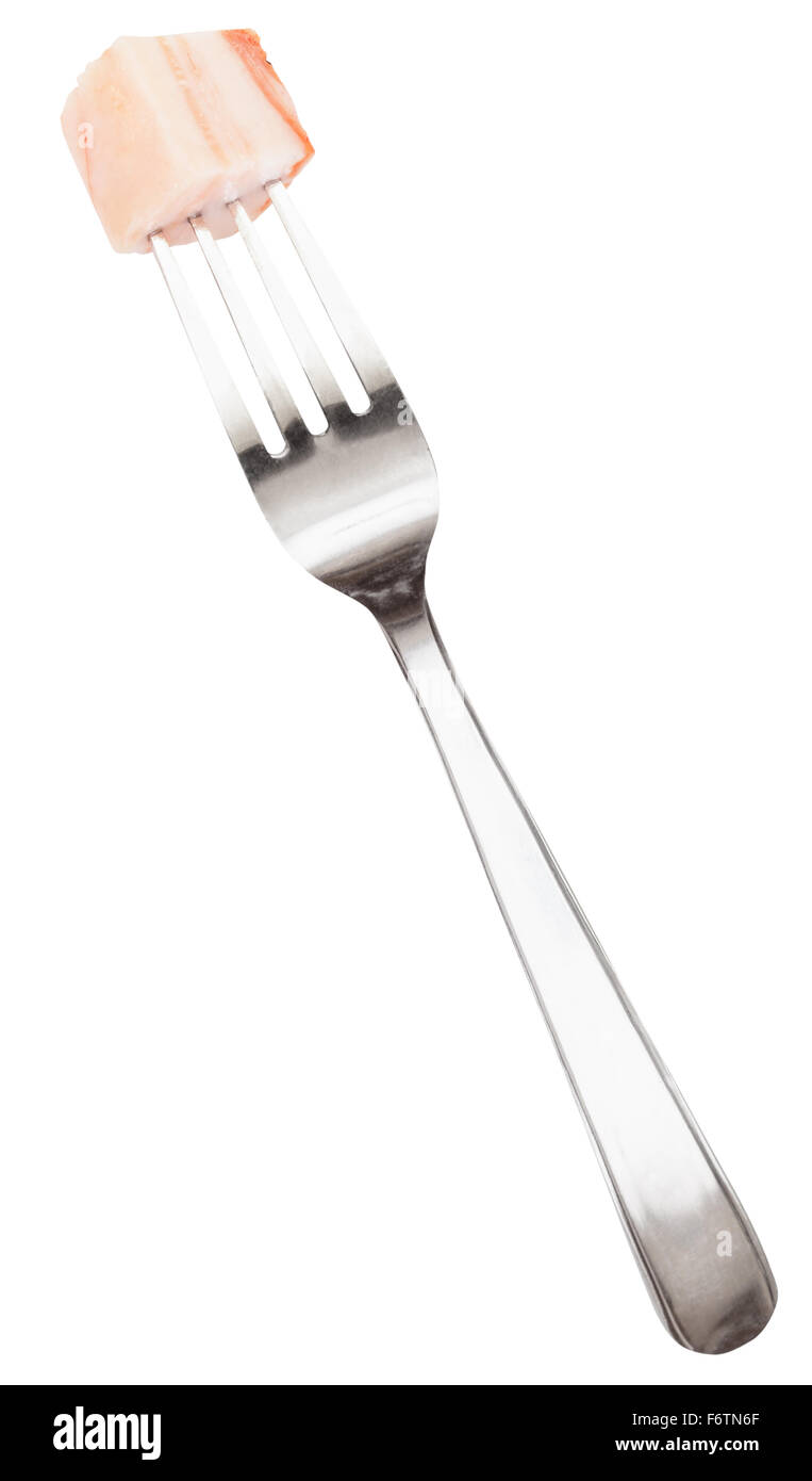 dinning fork with impaled piece of lard isolated on white background Stock Photo