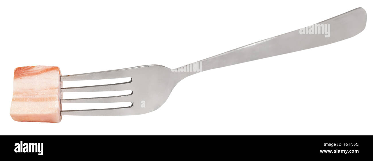 fork with impaled piece of salty lard isolated on white background Stock Photo