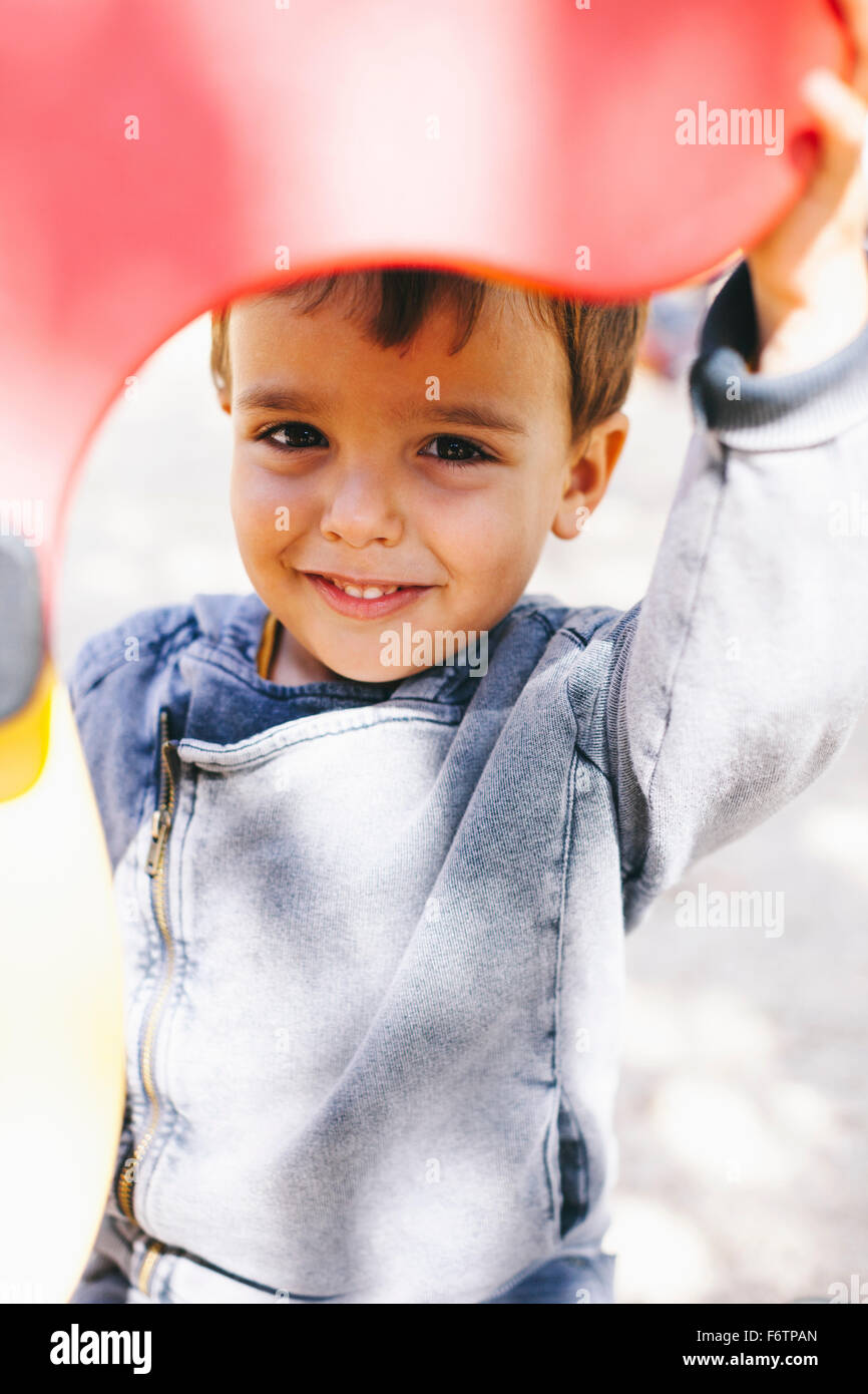 Portrait of smiling boy at the playground Stock Photo - Alamy