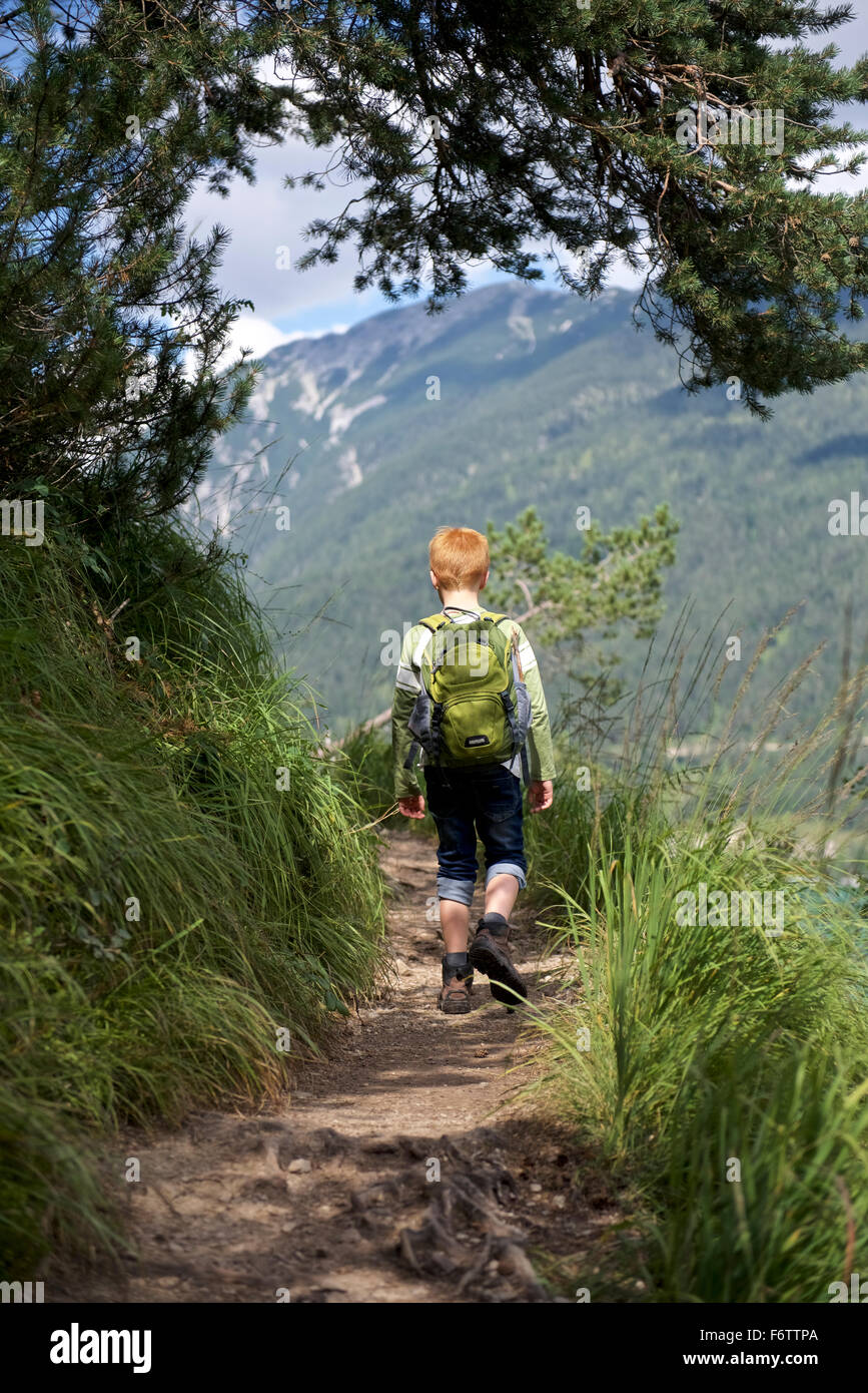 Austria, Tyrol, boy hiking at Achensee Stock Photo