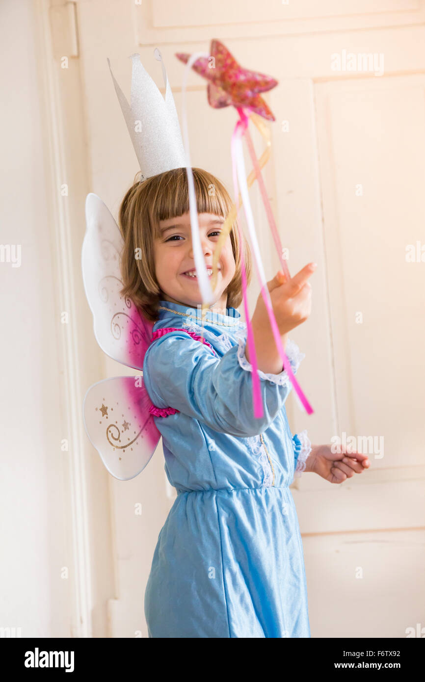 Portrait of little girl dressed up as fairy queen Stock Photo Alamy