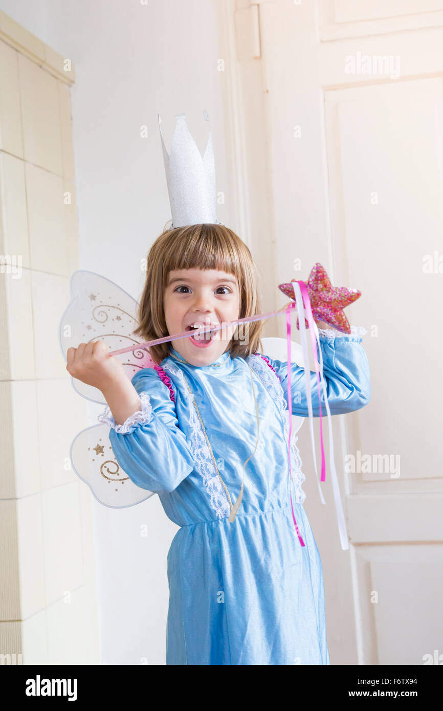 Portrait of little girl dressed up as fairy queen Stock Photo Alamy