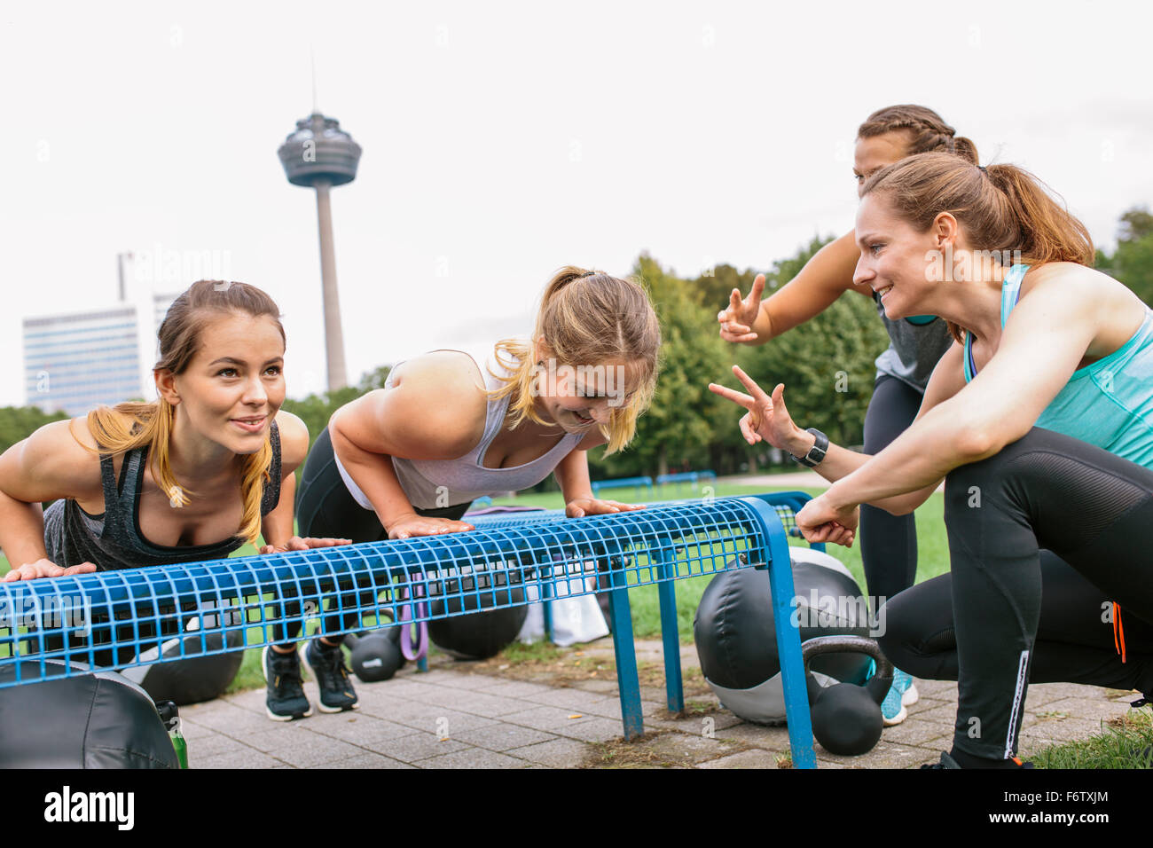 Four Women Having An Outdoor Boot Camp Workout Stock Photo Alamy