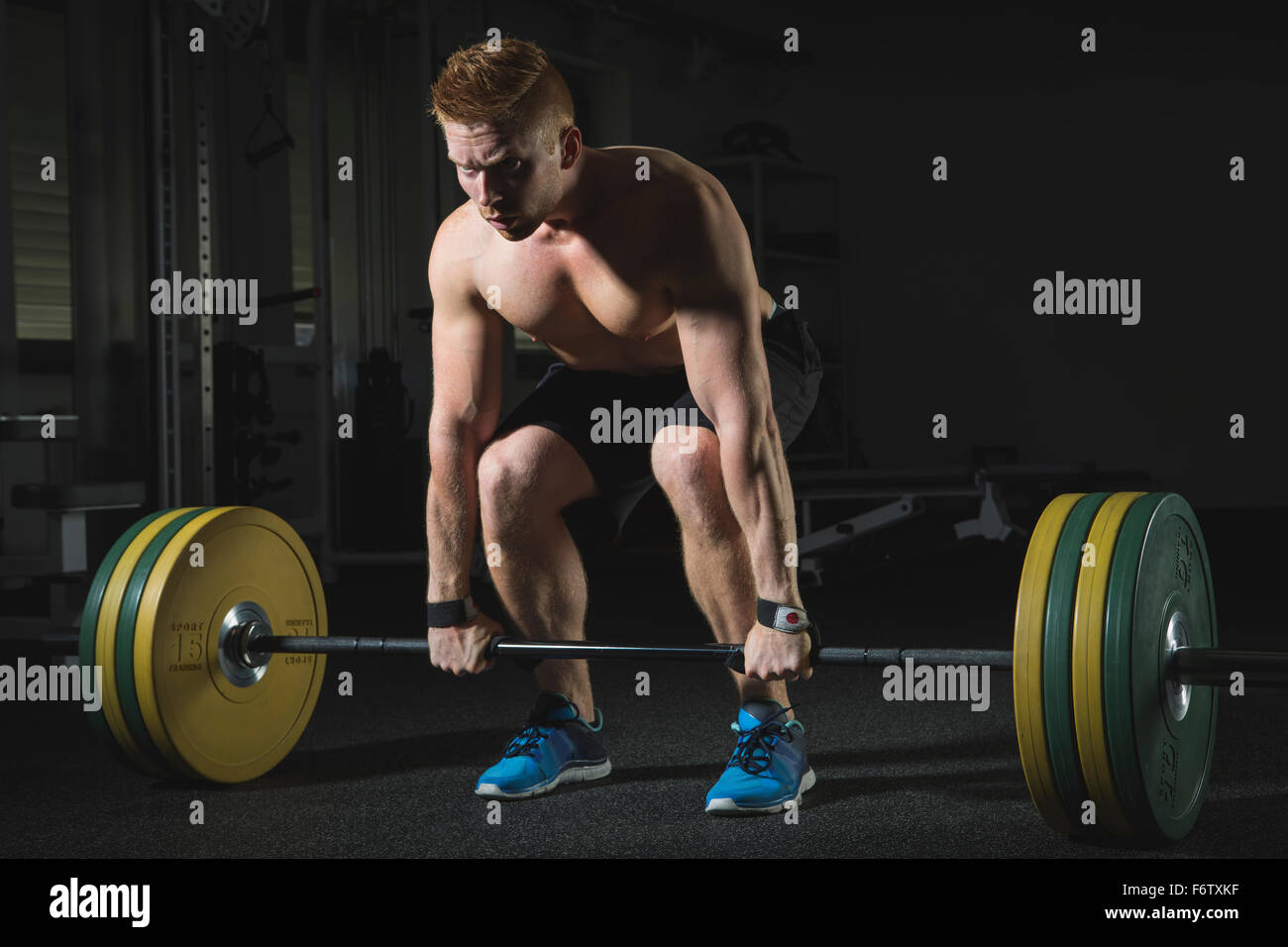 Physical athlete weightlifting Stock Photo