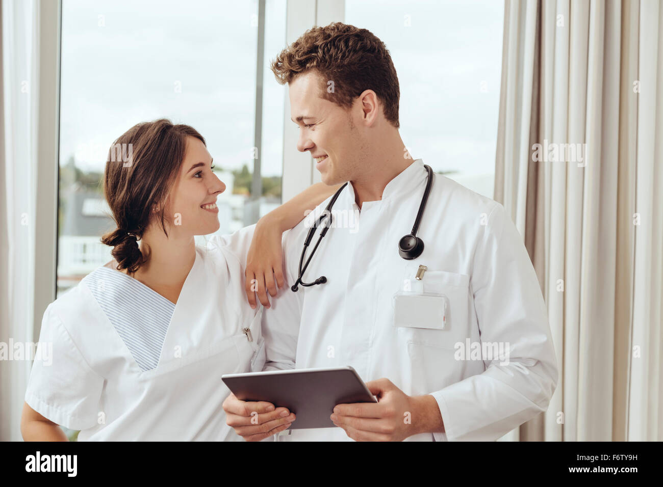 Nurse young doctor flirting work hires stock photography and images