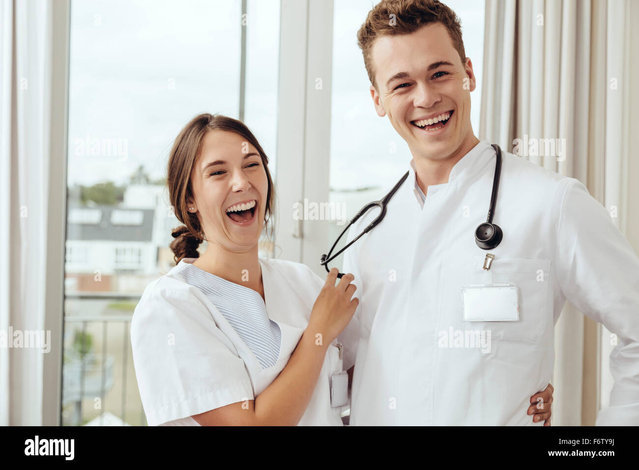 Nurse young doctor flirting work hires stock photography and images