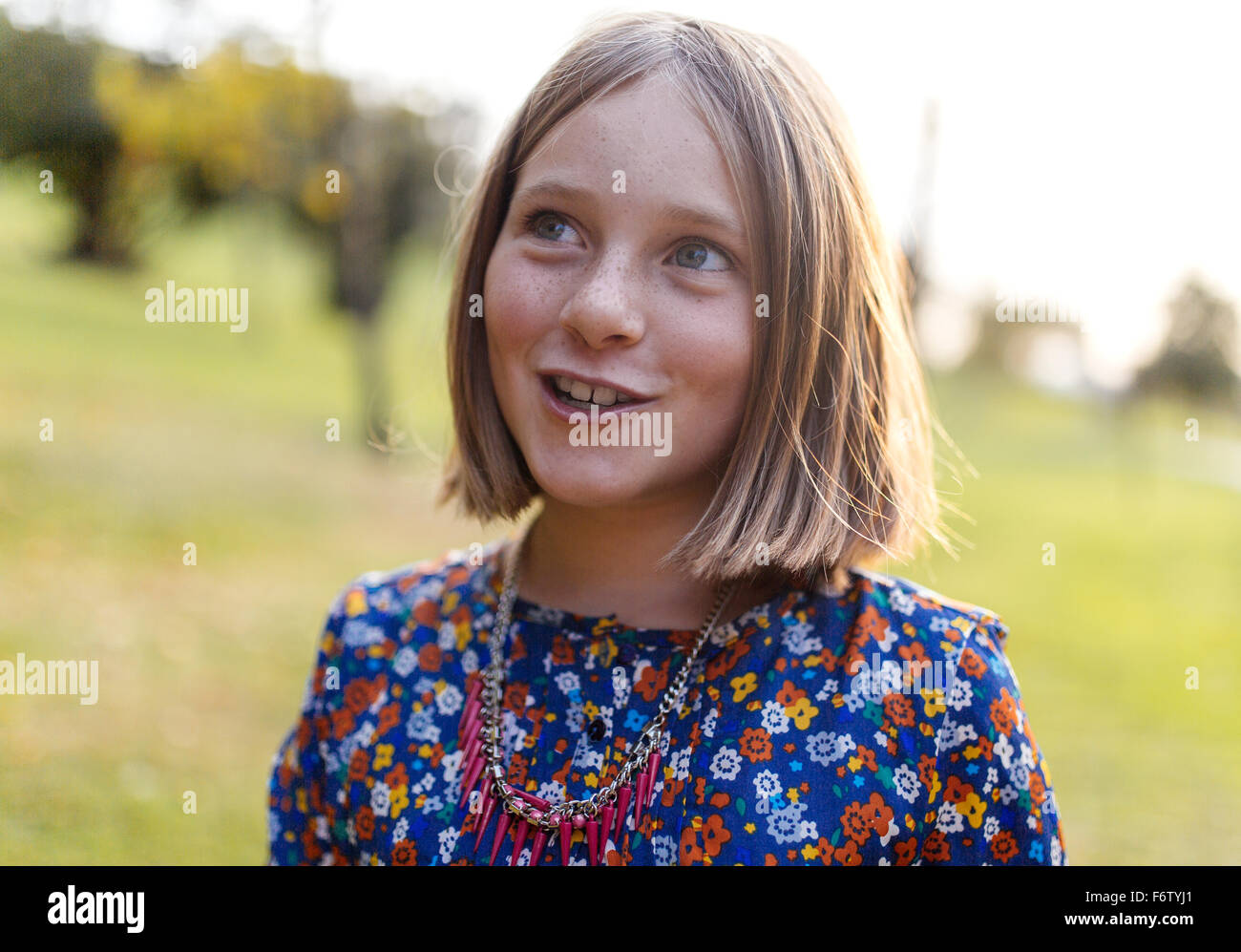 Portrait of smiling blond girl with freckles Stock Photo - Alamy