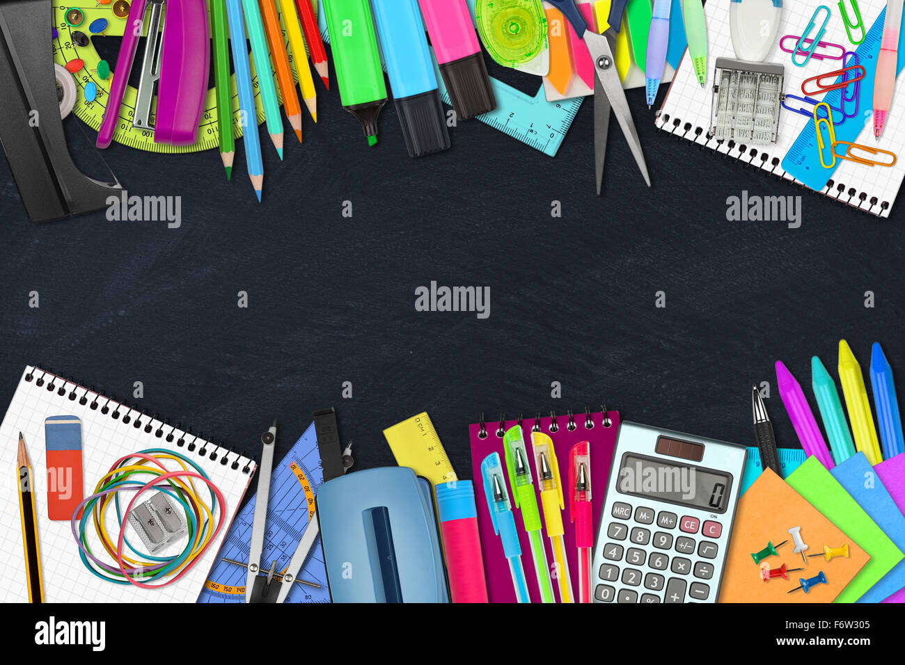 school / office supplies on slate background Stock Photo