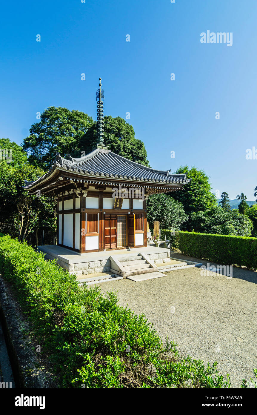 Japan, Honshu, Kyoto, Arashiyama bamboo forest with temple and graveyard Stock Photo