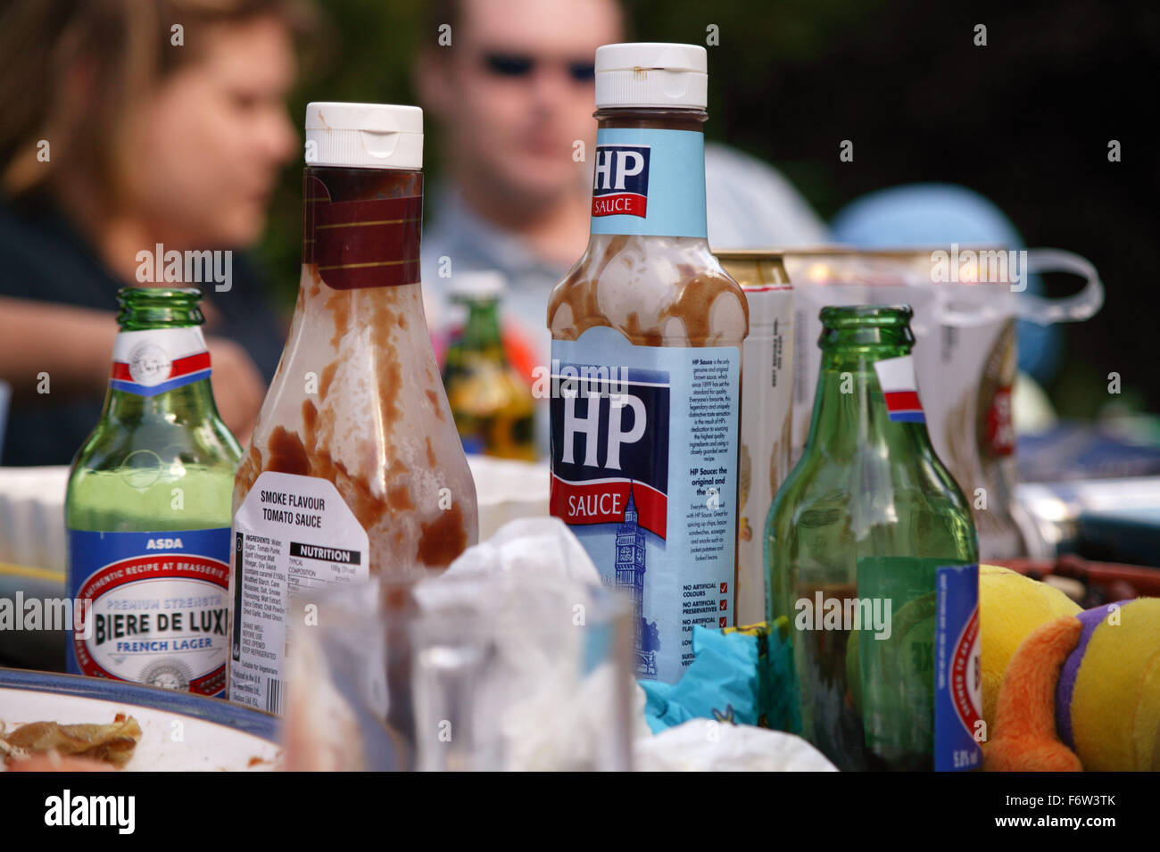 Beers and sauces on a garden party table, Stock Photo