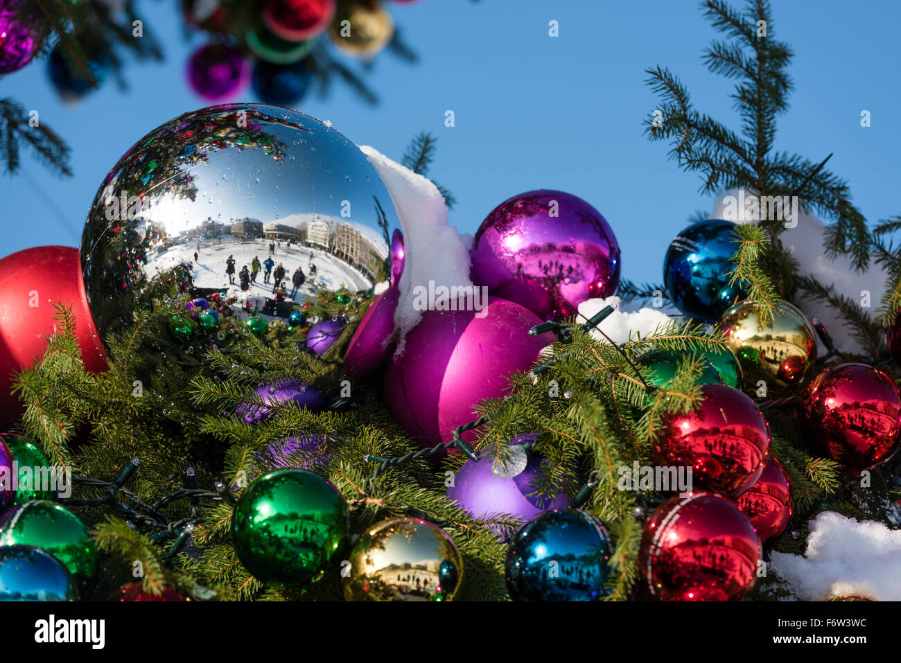 Colourful Christmas ball ornaments on a giant Christmas tree on  Saechselaeutenplatz, outside Zurich Opera house, Switzerland Stock Photo -  Alamy