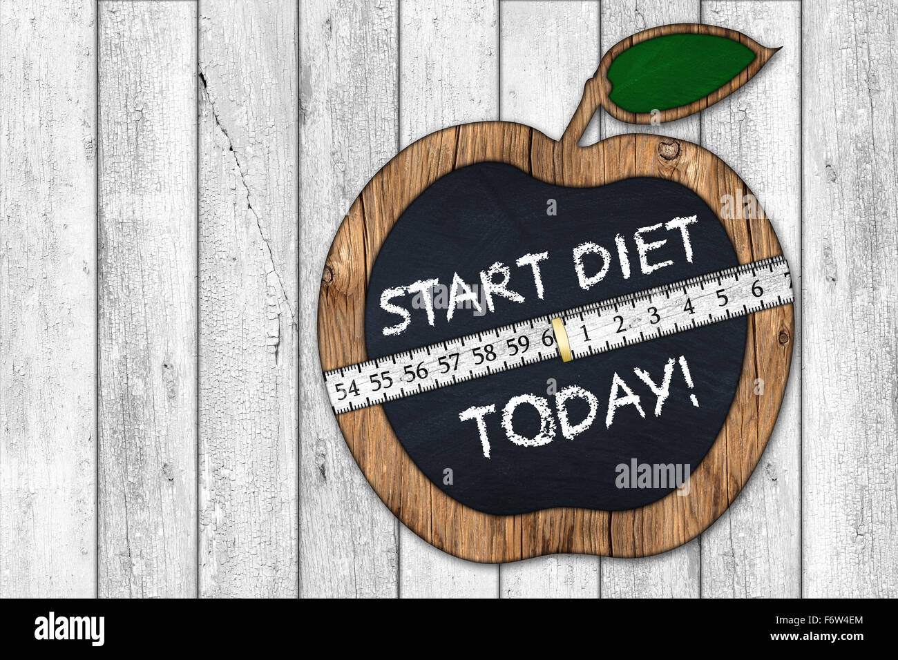 start diet today apple blackboard with measuring tape Stock Photo