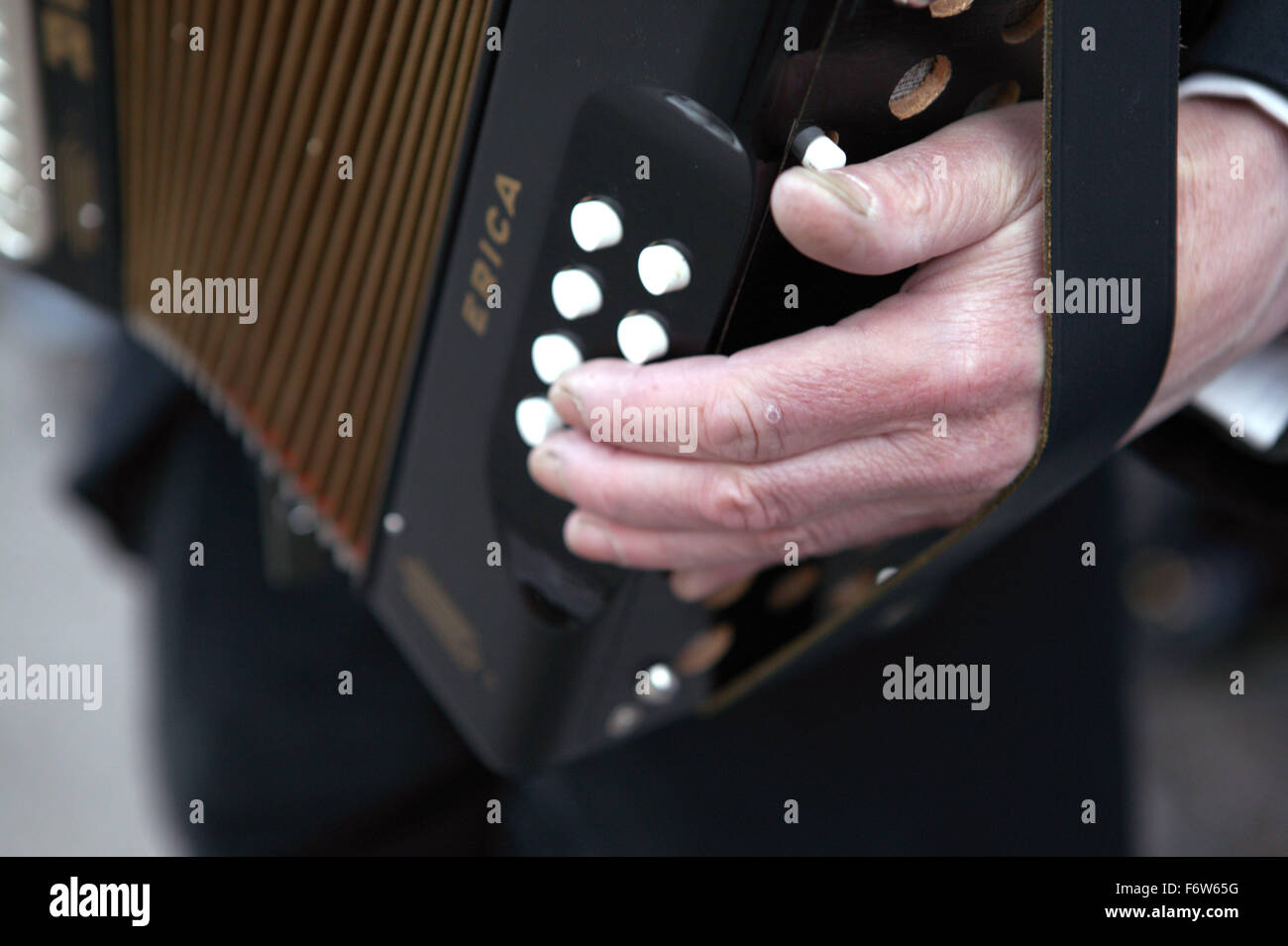 Close up of hand playing accordion Stock Photo Alamy
