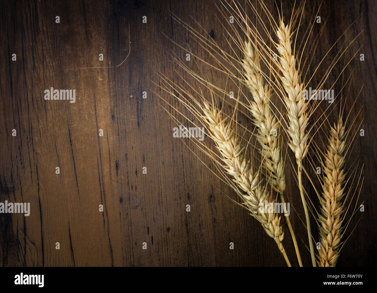 Wheat grain on the wood Stock Photo