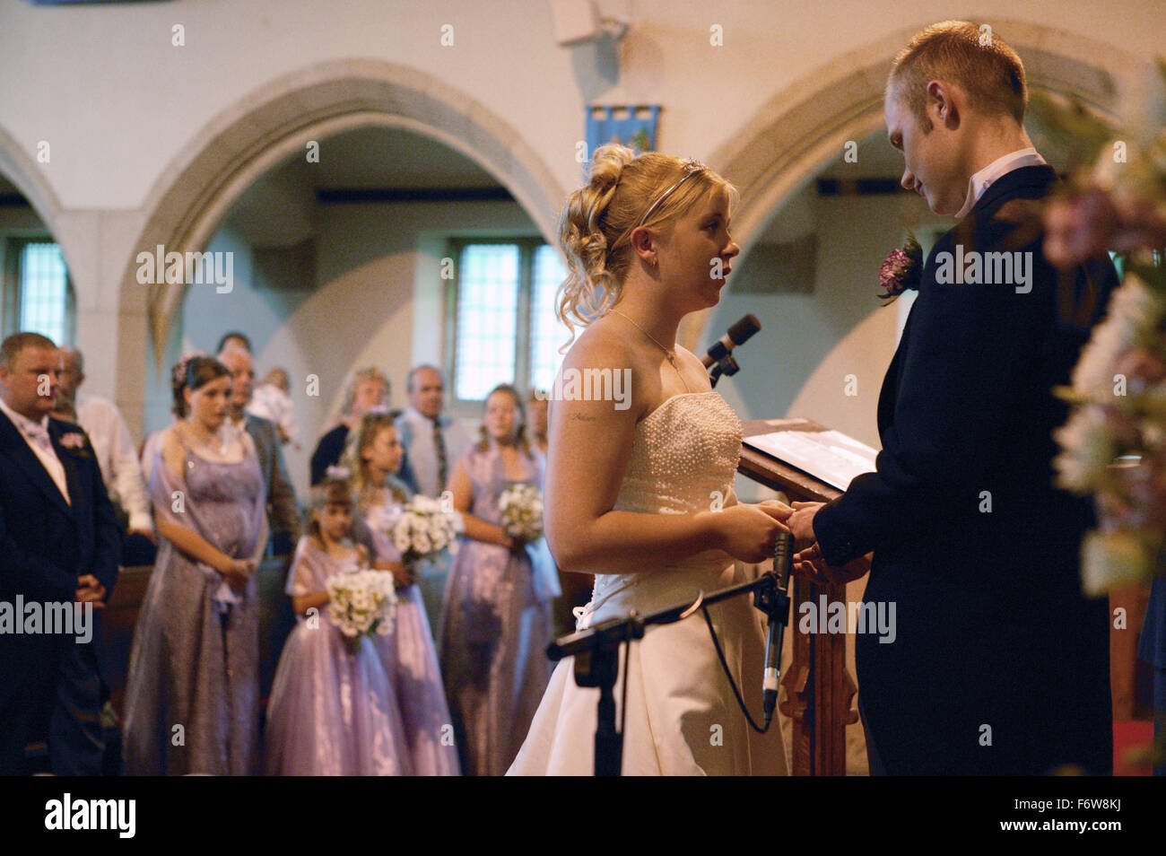 Bride And Groom Saying Wedding Vows During Marriage Ceremony Stock