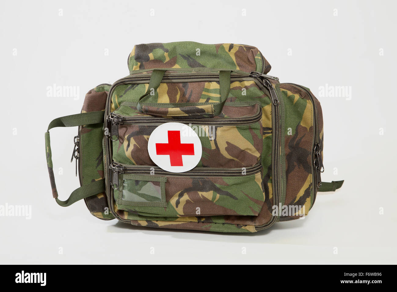 studio picture of a British army first aid pack in jungle camouflage fabric Stock Photo