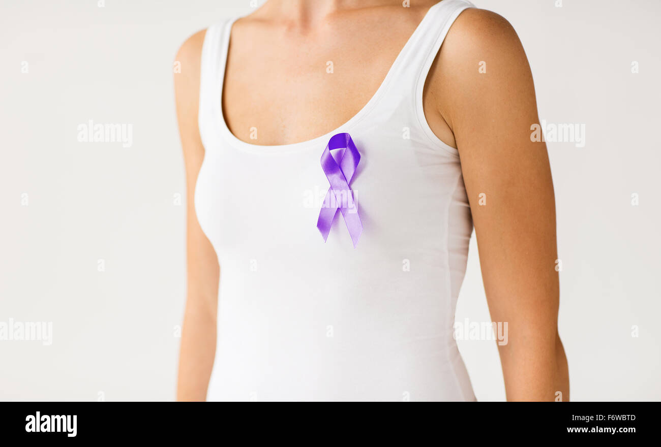 close up of woman with purple awareness ribbon Stock Photo - Alamy