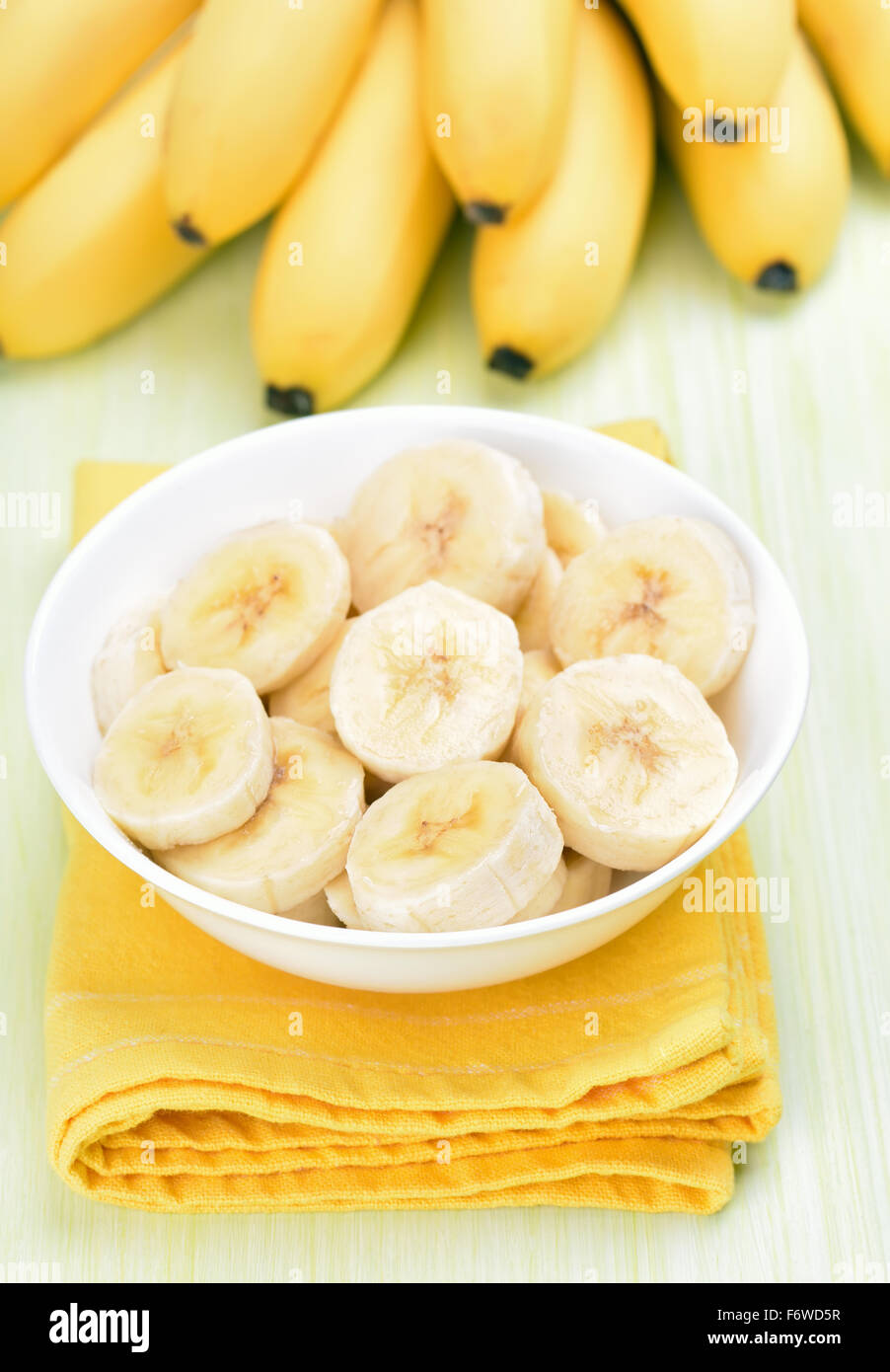Banana slices in white bowl Stock Photo Alamy