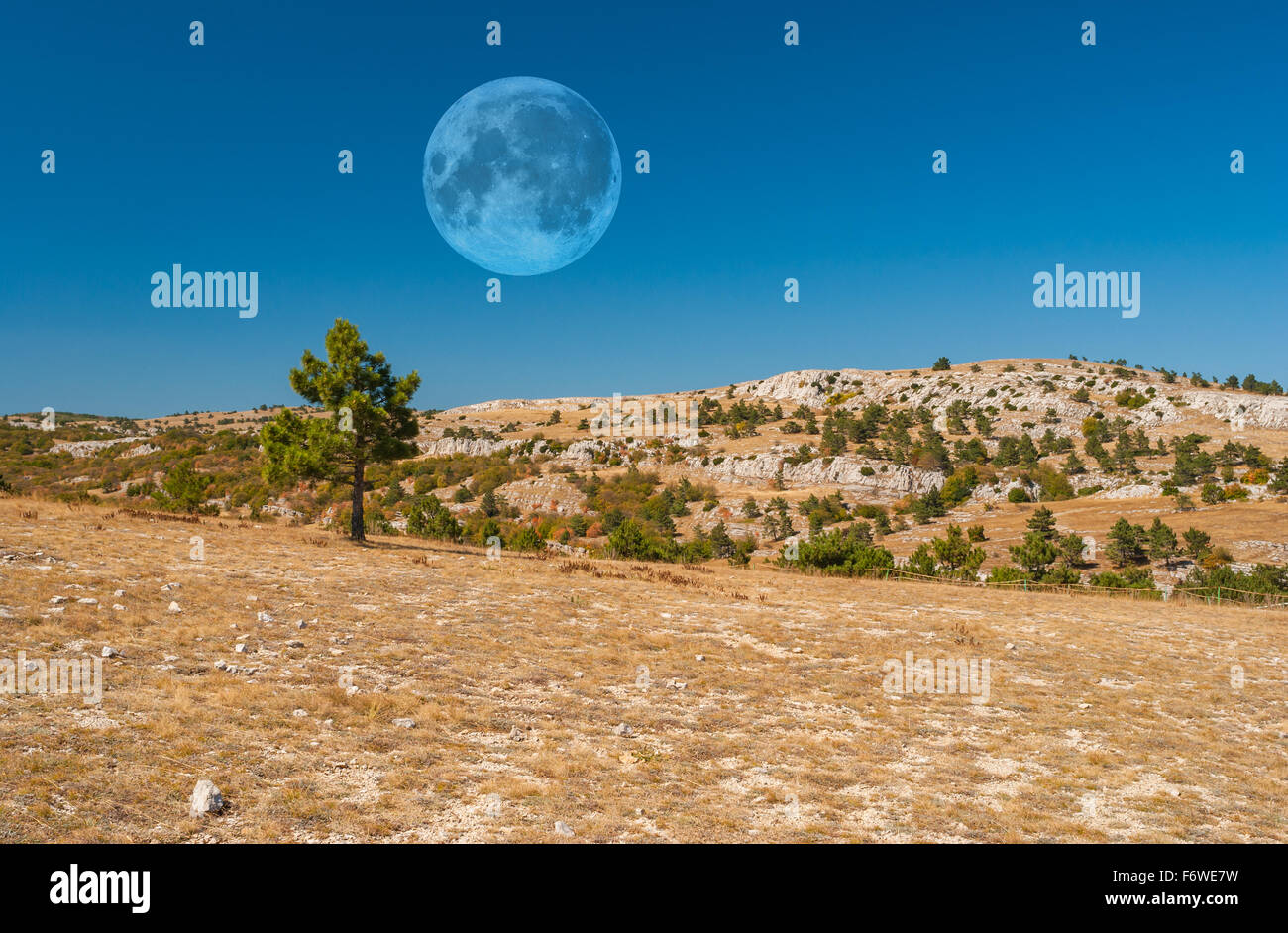 Desolate mountain landscape on a uninhabited planet Stock Photo