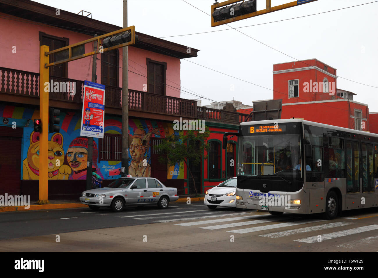 El Metropolitano B Line public bus and mural on wall in Barranco district, Lima, Peru Stock Photo