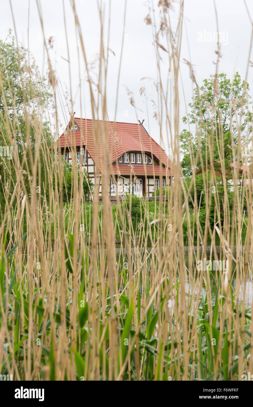 Half-timbered house at lake Tollensesee, Alt Rehse, Penzlin, Mecklenburg-Western Pomerania, Germany Stock Photo