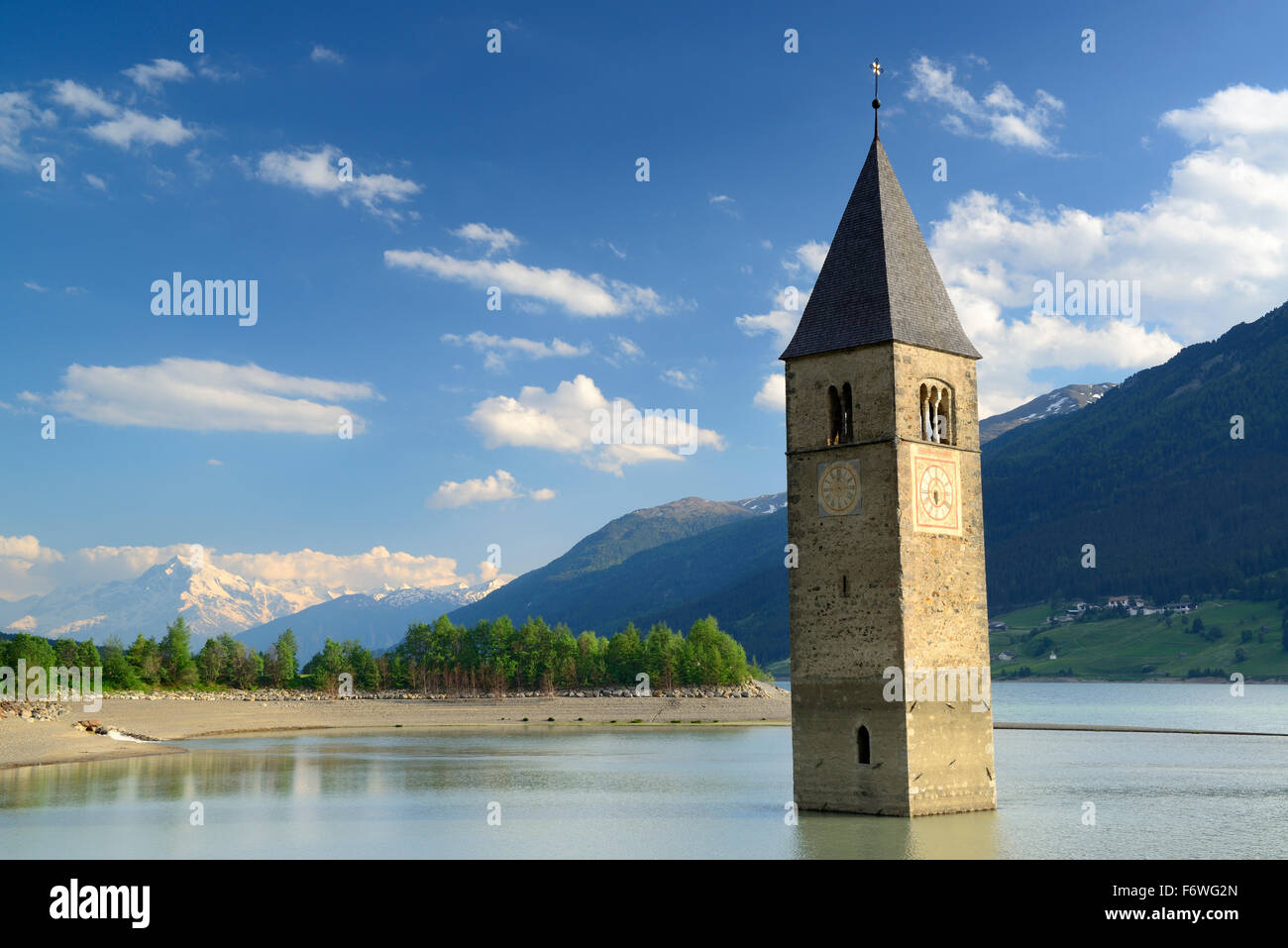 Bell tower in lake Reschensee, Ortler in the background, Reschen, lake Reschensee, Reschen Pass, Vinschgau, South Tyrol, Italy Stock Photo