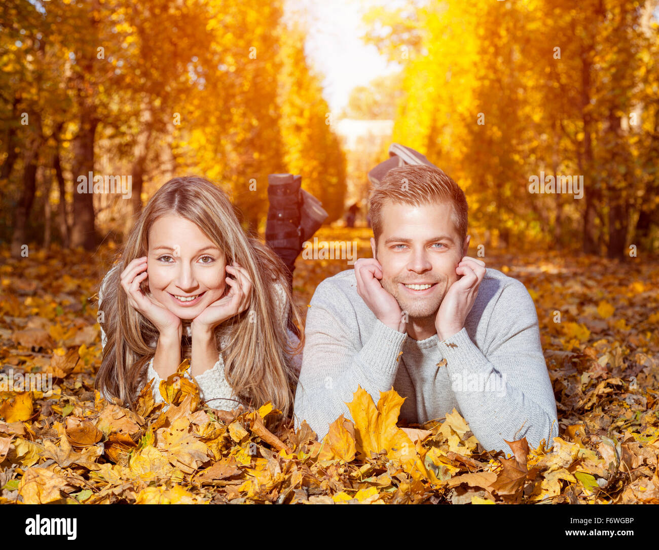 Young happy couple outdoors in autumn Stock Photo - Alamy
