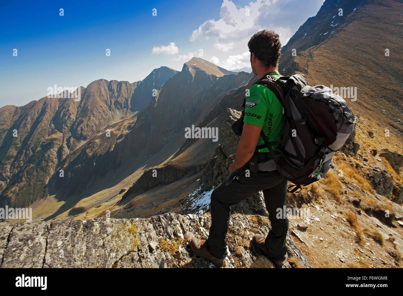 mountaineer on the way to Vf. Moldoveanu, Fagaras Mountains, Transylvania, Romania Stock Photo