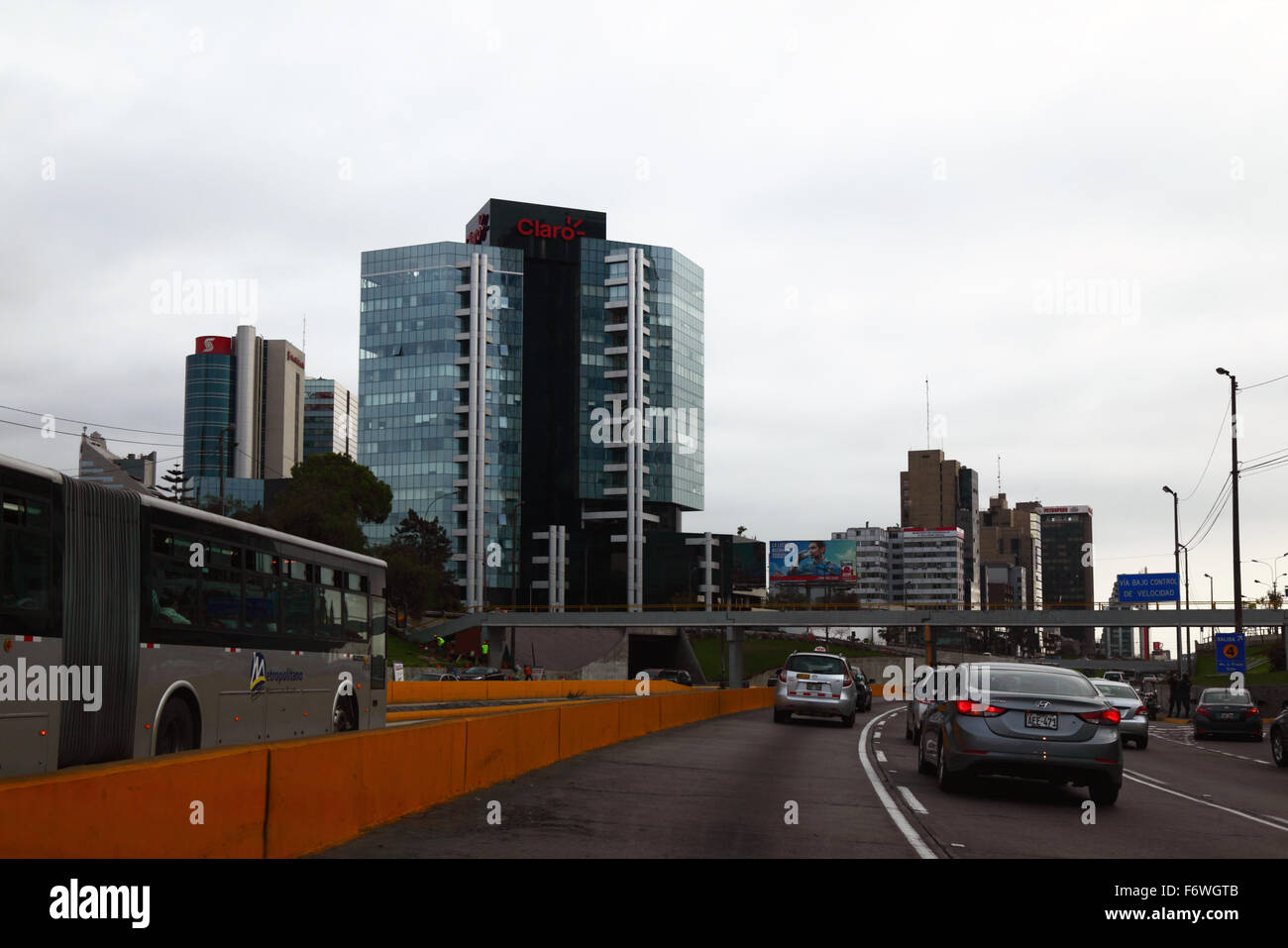 El Metropolitano public bus on Via Expresa, Scotiabank and Claro buildings in background, San Isidro, Lima, Peru Stock Photo