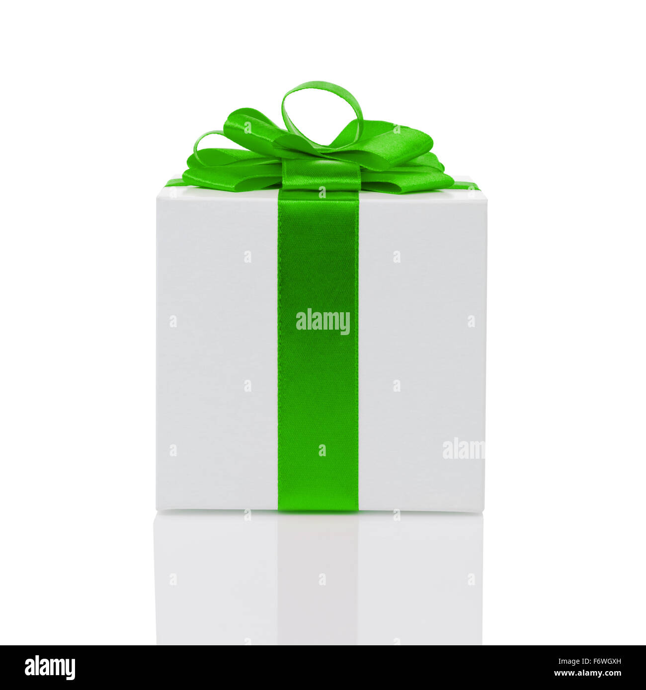 white paper gift box with green ribbon bow isolated Stock Photo