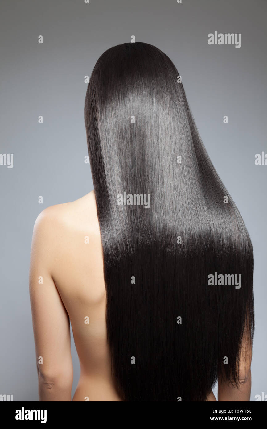 Back view of a woman with long straight hair Stock Photo - Alamy Back view of a woman with long straight hair Stock Photo - Alamy