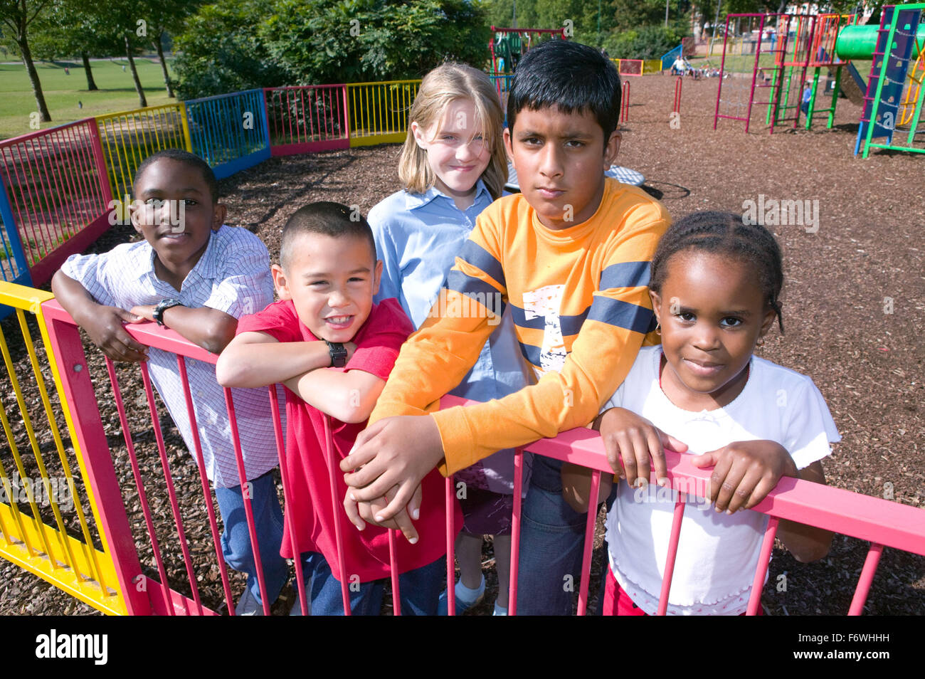 Group of young friends out in the park together, Stock Photo