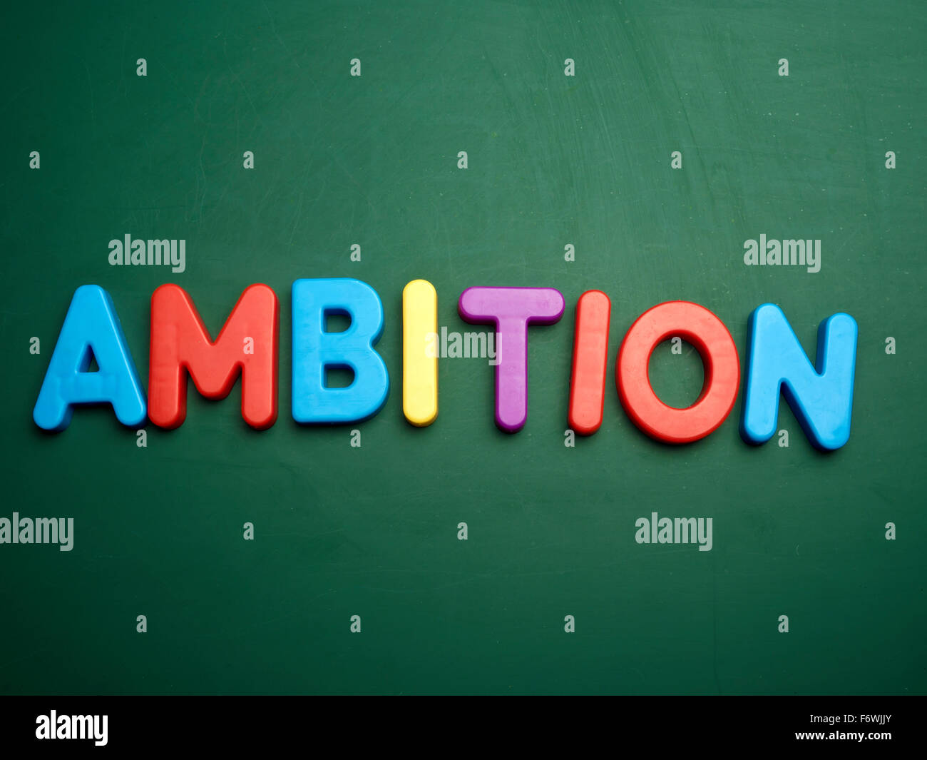 ambition concept in colorful letters isolated on blank blackboard Stock Photo