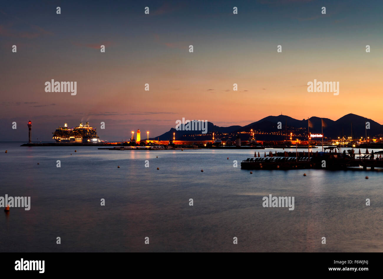Cruise ships at anchor in the Golfe de la Napoule at sunset, Cannes,Provence, France Stock Photo