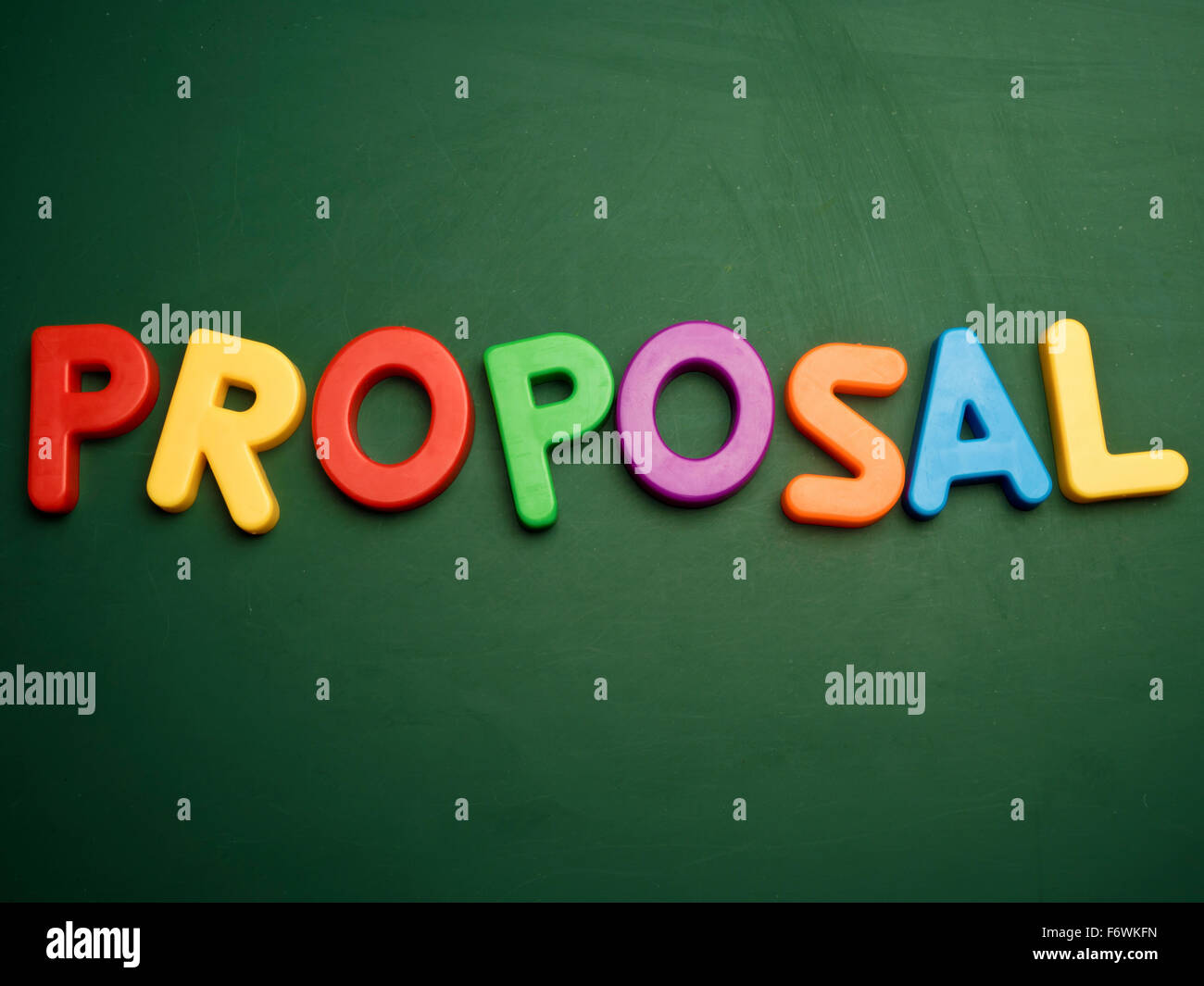 proposal concept in colorful letters isolated on blank blackboard Stock Photo